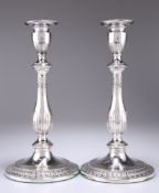 A PAIR OF GEORGE III SILVER CANDLESTICKS