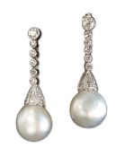 A PAIR OF NATURAL SALTWATER PEARL AND DIAMOND PENDANT EARRINGS