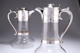 A PAIR OF VICTORIAN SILVER-MOUNTED CLARET JUGS