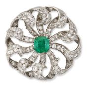 AN EMERALD AND DIAMOND BROOCH