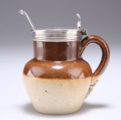 A VICTORIAN SILVER-MOUNTED SALT-GLAZED STONEWARE MUSTARD WITH SPOON