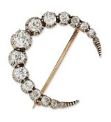 A DIAMOND CRESCENT BROOCH