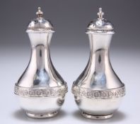 A PAIR OF VICTORIAN SILVER PEPPERS