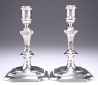 A PAIR OF GEORGE I SILVER CANDLESTICKS