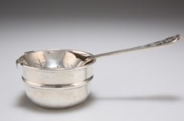 AN ELIZABETH II SILVER TEA STRAINER ON STAND