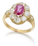 A RUBY AND DIAMOND CLUSTER RING