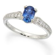 A PLATINUM SAPPHIRE AND DIAMOND RING