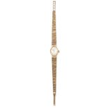 LADYS 9 CARAT GOLD ROTARY BRACELET WATCH