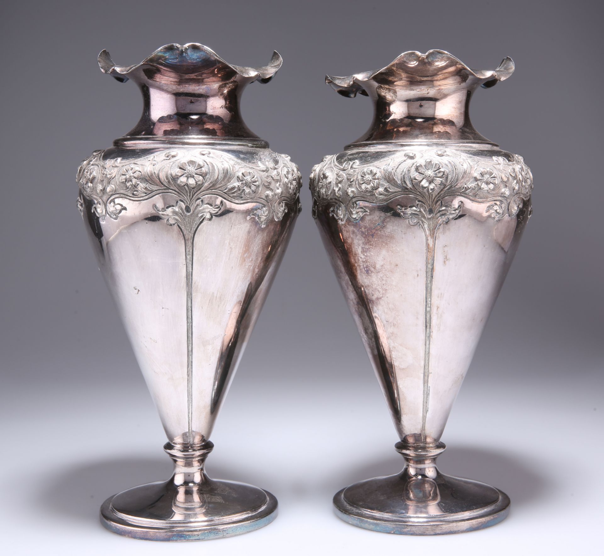 A LARGE PAIR OF ART NOUVEAU SILVER-PLATED VASES,