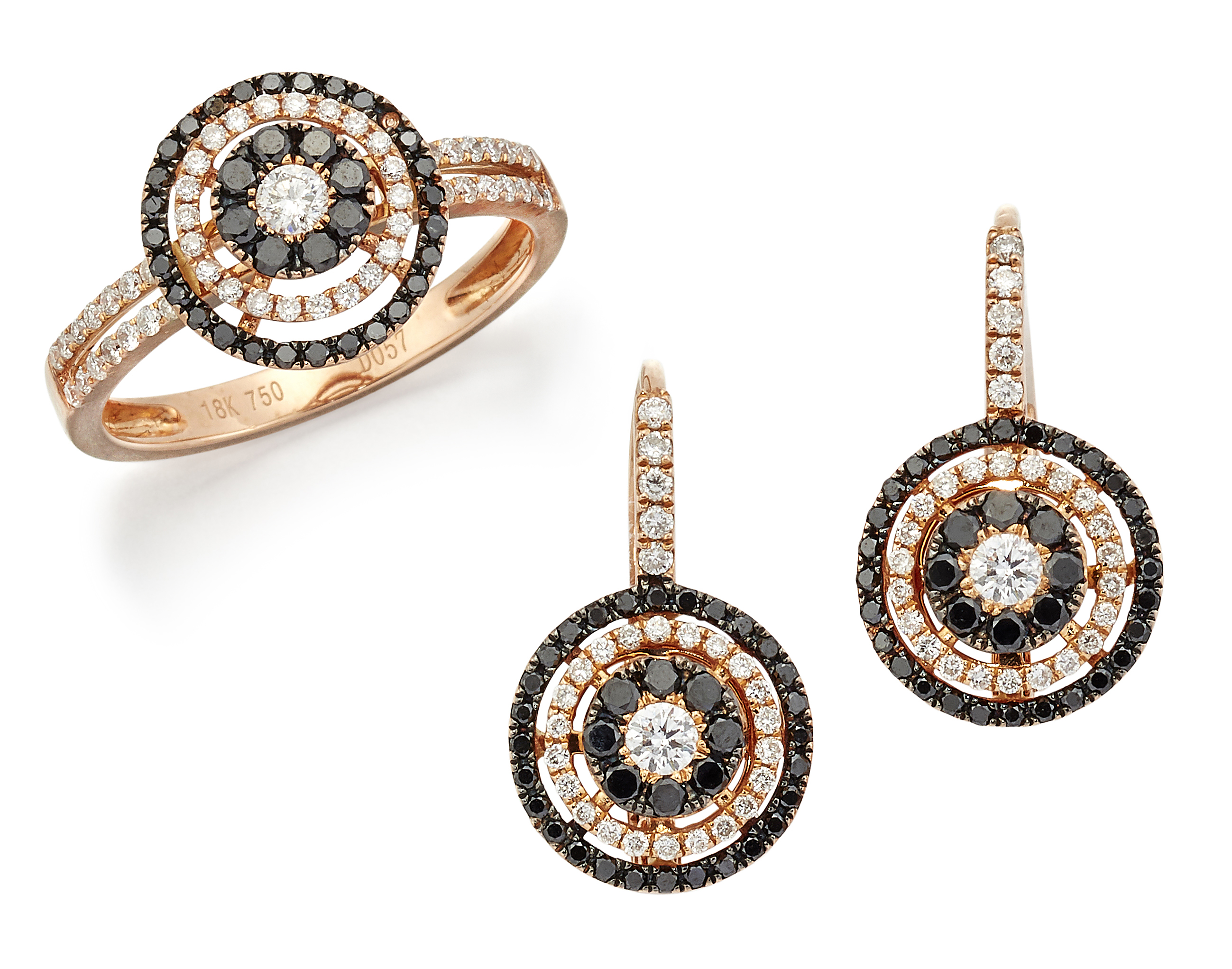 A DIAMOND RING AND EARRING SUITE