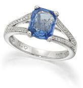 AN 18 CARAT WHITE GOLD SAPPHIRE AND DIAMOND RING