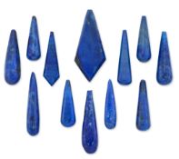 TWELVE PIECES OF WORKED LAPIS LAZULI