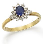 AN 18 CARAT GOLD SAPPHIRE AND DIAMOND RING