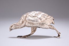 A WHITE-METAL MODEL OF A PARTRIDGE