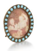 A TURQUOISE SET PHOTOGRAPH FRAME