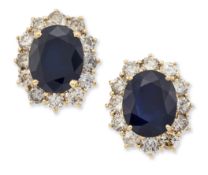 A PAIR OF 18 CARAT GOLD SAPPHIRE AND DIAMOND CLUSTER EARRINGS