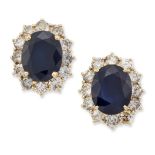 A PAIR OF 18 CARAT GOLD SAPPHIRE AND DIAMOND CLUSTER EARRINGS