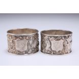 A PAIR OF CHINESE SILVER NAPKIN RINGS