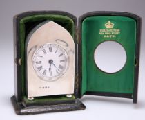 AN EDWARDIAN SILVER TRAVELLING CLOCK