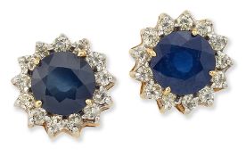 A PAIR OF SAPPHIRE AND DIAMOND CLUSTER EARRINGS