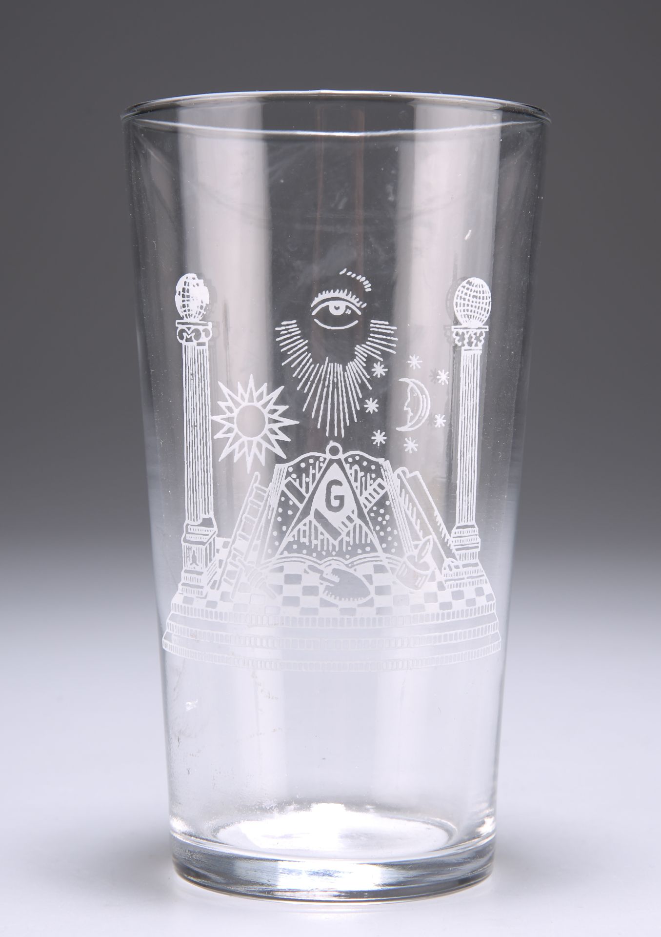 A MASONIC BEAKER, 20TH CENTURY, the tapering cylindrical glass with Masonic symbols to the front.
