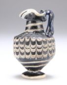 A RARE GREEK CORE-FORMED GLASS OINOCHOE, CIRCA 1ST-4TH CENTURY BC