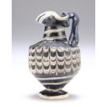 A RARE GREEK CORE-FORMED GLASS OINOCHOE, CIRCA 1ST-4TH CENTURY BC