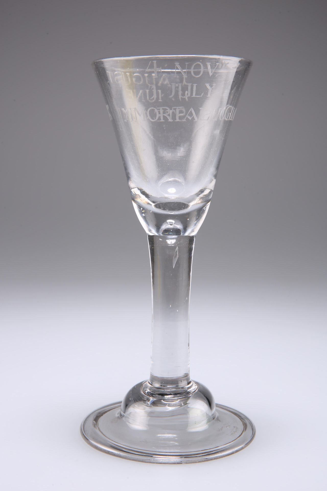 A LARGE WINE GLASS, CIRCA 1735