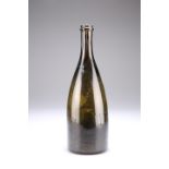 A MID-19TH CENTURY GREEN GLASS WINE BOTTLE, with partially fluted neck and unusually deep kick-in