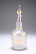 A GILDED DECANTER AND STOPPER
