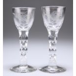 TWO JACOBITE STYLE CORDIAL GLASSES, POSSIBLY WHITEFRIARS, each bowl engraved with a bird and