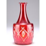 A RUBY GLASS DECANTER OR CARAFE