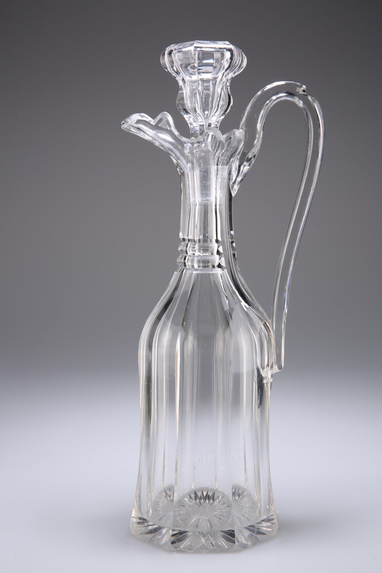 A HEAVY VICTORIAN CUT-GLASS DECANTER