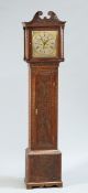 A CARVED OAK LONGCASE CLOCK