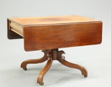 A 19TH CENTURY MAHOGANY DROP LEAF BREAKFAST TABLE