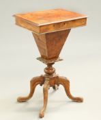 A VICTORIAN BURR WALNUT WORK TABLE