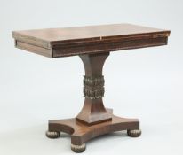 A 19TH CENTURY ROSEWOOD FOLDOVER CARD TABLE BY GILLOW AND CO