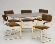 AFTER MARCEL BREUER A GILT METAL DINING SUITE