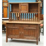 AN ARTS AND CRAFTS OAK SIDEBOARD