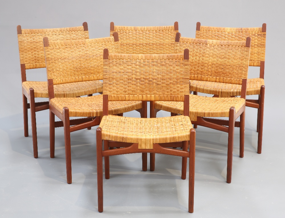 HANS J. WEGNER A SET OF SIX CARL HANSON AND SON DANISH TEAK AND RATTAN DINING CHAIRS