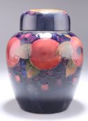 WALTER MOORCROFT, A POTTERY GINGER JAR AND COVER