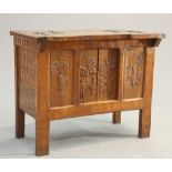 AN UNUSUAL ARTS AND CRAFTS OAK 'HUNTING' CABINET