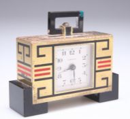 A CARTIER GILT-BRASS AND ENAMEL ALARM CLOCK