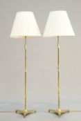 A PAIR OF FRENCH 1930S BRASS STANDARD LAMPS