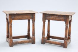 A PAIR OF OAK JOINT STOOLS, PROBABLY BY TITCHMARSH AND GOODWIN