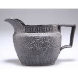 A 19TH CENTURY BLACK BASALT JUG