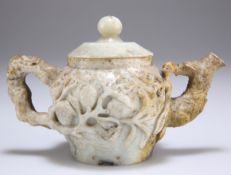 A 19TH CENTURY CHINESE JADE TEAPOT AND COVER