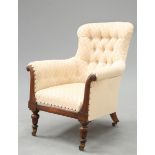 A VICTORIAN ROSEWOOD AND UPHOLSTERED ARMCHAIR OF GILLOWS TYPE