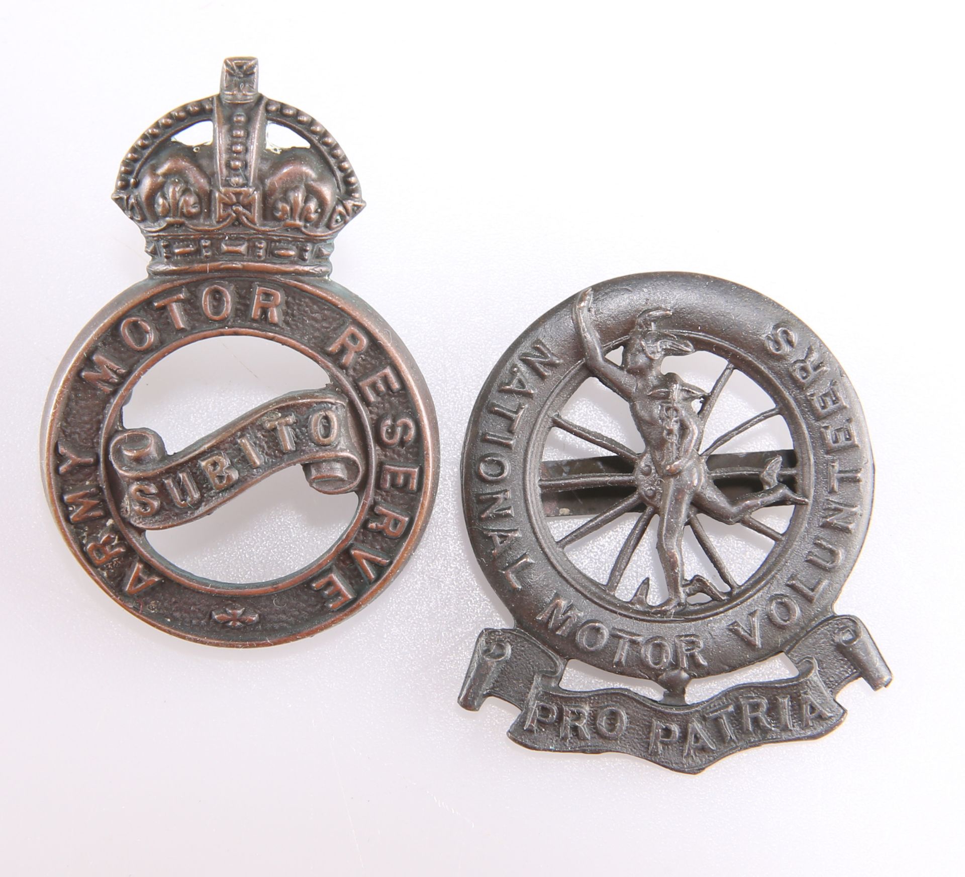 TWO BRONZE BADGES