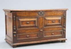 A LATE 17TH CENTURY ELM AND OAK MOULDED-FRONT COFFER